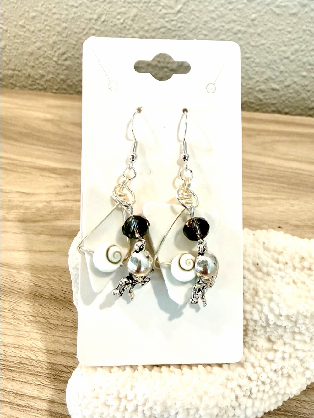 12. White Sea glass earrings with octopus charms and shiva shells